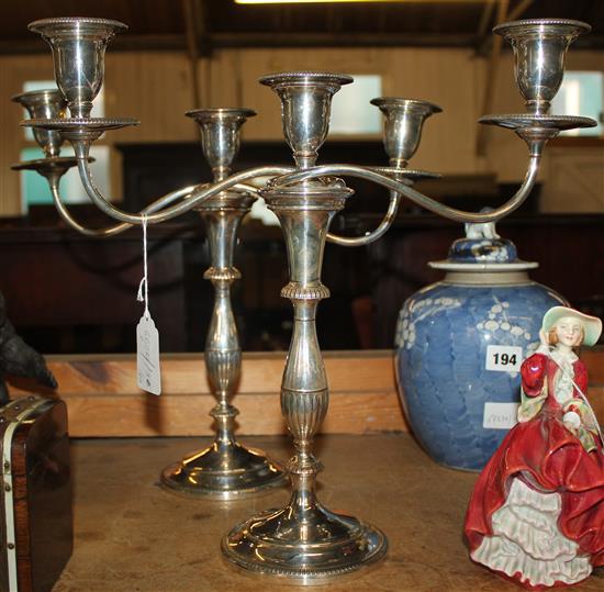 Pair of late 19th/early 20th century silver plated on copper two branch, three light candelabra, height 15in(-)